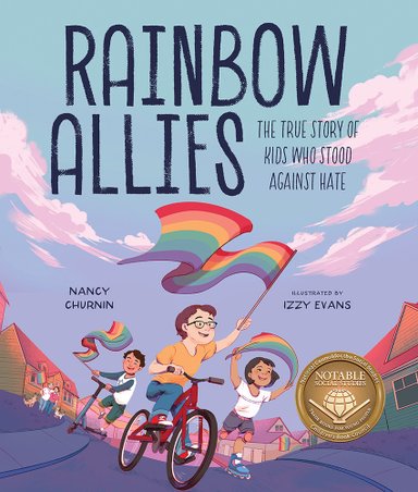 Book cover of Rainbow Allies: The True Story of Kids Who Stood Against Hate by Nancy Churnin, Illustrated by Izzy Evans, featuring three smiling children of diverse skin tones and hair colors/textures biking, rollerblading, and scootering down a suburban street waving rainbow flags; behind them, two women are visible with arms around one another.