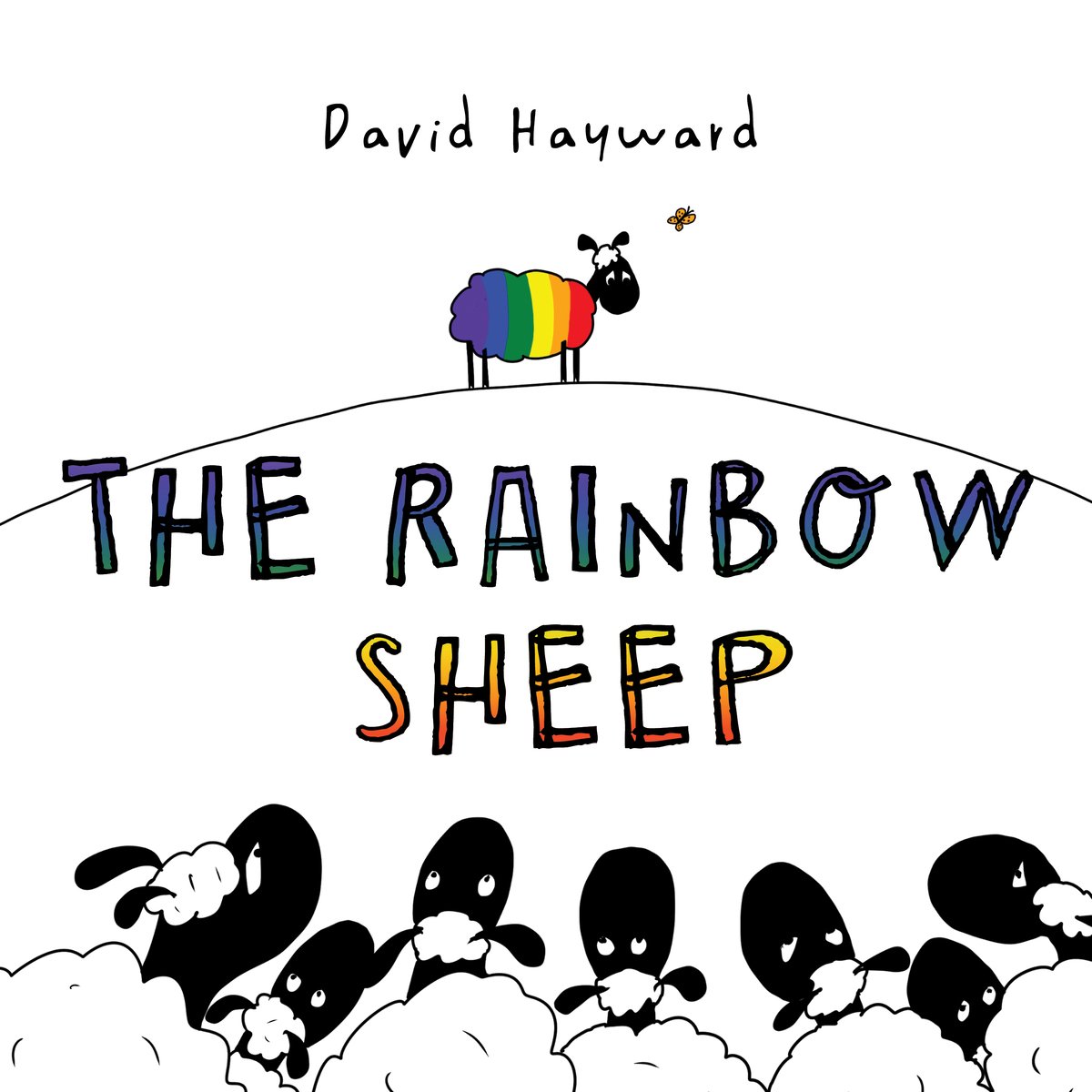 Book cover of The Rainbow Sheep by David Hayward, featuring a rainbow-colored sheep standing on top of a hill while a collection of white and black sheep stare up at them from the base of the hill.