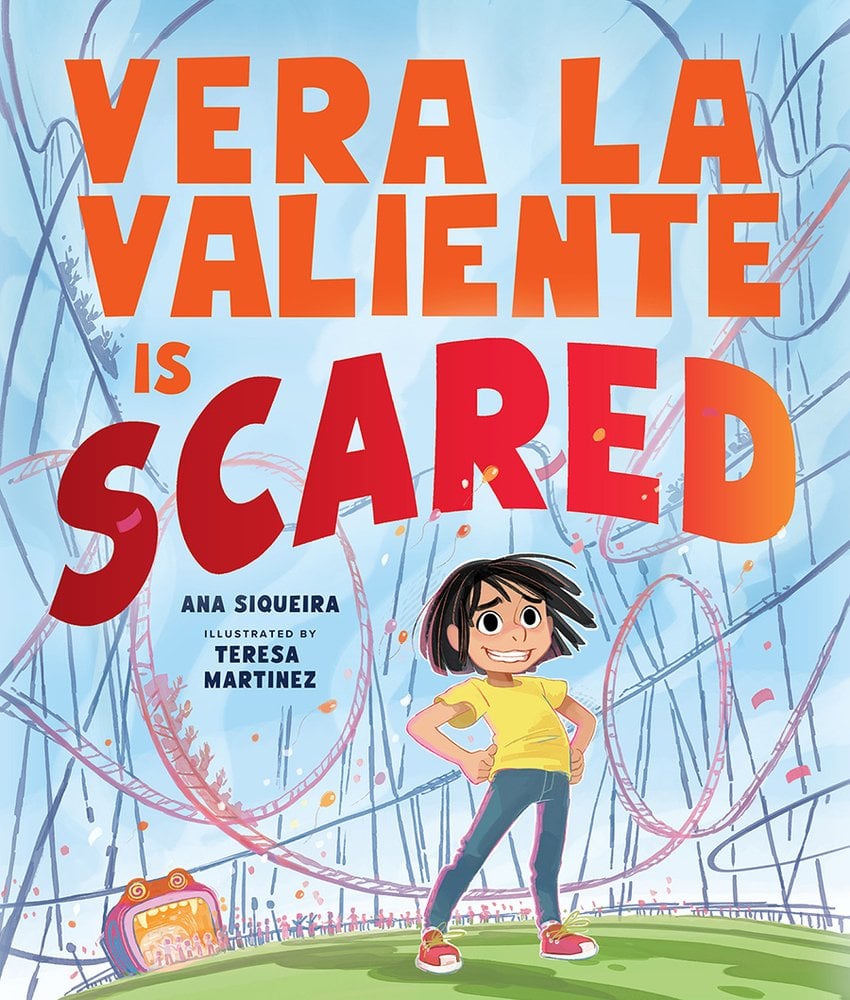 Book cover of Vera La Valiente Is Scared by Ana Siqueira, Illustrated by Teresa Martinez, featuring a tan-skinned child with chin-length straight dark hair, standing with hands on hips but a nervous expression in front of a wildly twisting roller coaster.