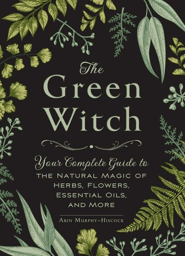 The Green Witch by Arin Murphy-Hiscock witchy book cover depicting a black background with the title and author name in thin, light green text in the center surrounded by leaves of various sizes, shapes, and color.