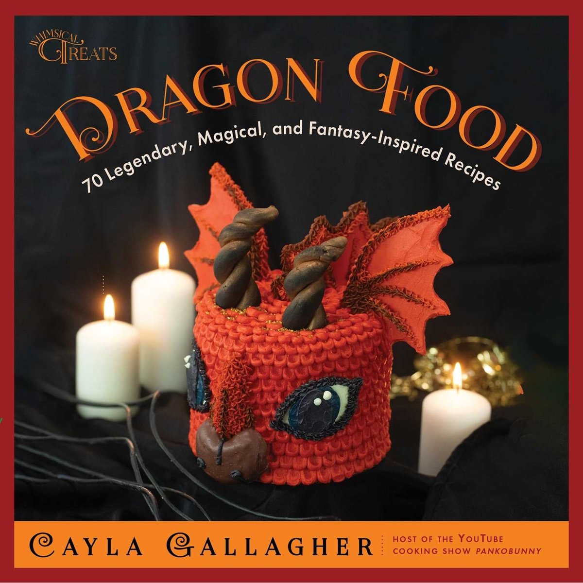 Book cover of Dragon Food by Cayla Gallagher, featuring a red 3-D cake shaped like the head, horns, and wings of a dragon on a candlelit table.