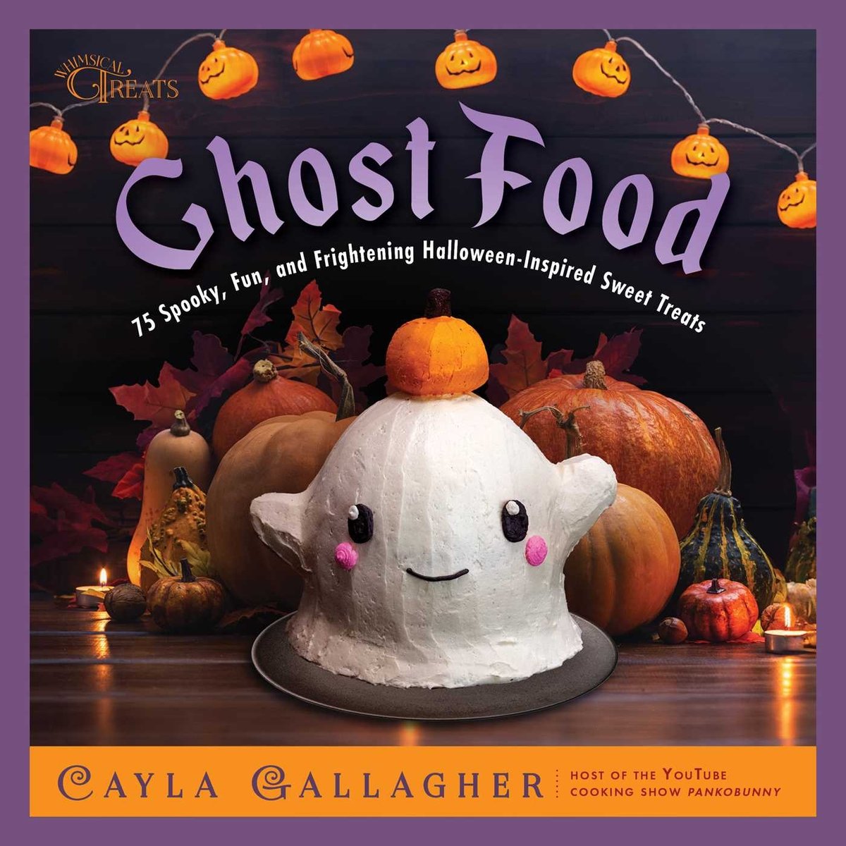 Book cover of Ghost Food by Cayla Gallagher, featuring a 3-D cake shaped like a smiling cartoon ghost with a pumpkin on its head, surrounded by real pumpkins and gourds on a candlelit table.