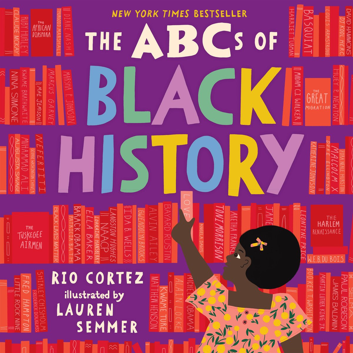 This children's book cover has a purple background with red books all around. There is an African American girl who is reaching for one of the red books. In variations of colors such as blue, green, purple, and yellow the title The ABCs of Black History by Rio Cortez is writte.
