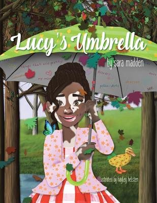 Lucy’s Umbrella by Sara Madden, Illustrated by Hayley Helsten, book cover. A young Black girl with vitiligo stands in the middle of a forest wearing a pink jacket and a red, striped dress. She is holding a green umbrella above her head and a yellow duck stands behind her, along with a blue butterfly on her shoulder.