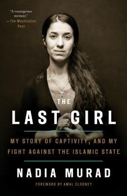The last girl my story of captivity and my fight against the islamic state by nadia murad book cover featuring a woman with long hair holding her hands togther with a darker color scheme.