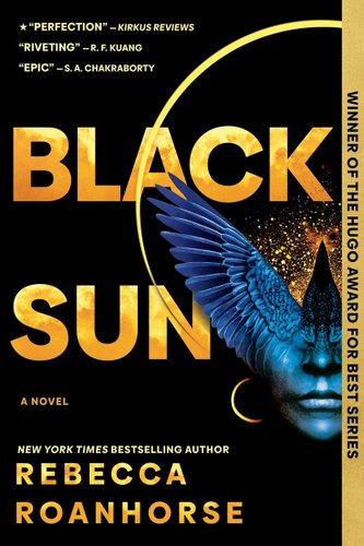 Black Sun by Rebecca Roanhorse book cover. A woman's face is shown from the nose down on the right side of the cover. From the nose up the eyes are replaced by the wings of a bird. Both are a royal blue color. behind the face is a sky of golden stars. On the left side of the cover the title is written in all capital gold lettering.
