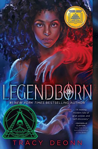 Legendborn by Tracy Deonn, book cover. A young black girl with large, dark curls stares directly to the audience. She has one arm lifted and above her chest with red, magical circular rings surrounding it while her other hand is across her abs with similar powers exuding but in blue.