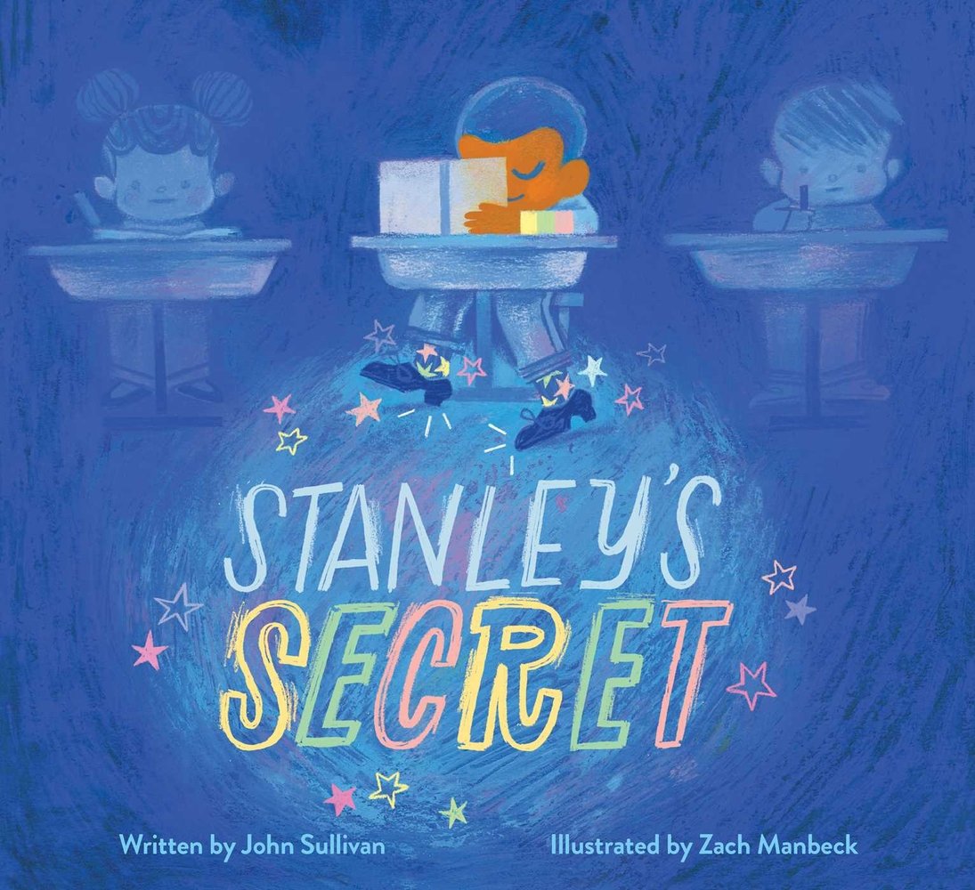 Book cover of Stanley's Secret by John Sullivan, Illustrated by Zach Manbeck, featuring a smiling brown-skinned boy with short black hair sitting at a desk and holding up a book that partially covers his face; beneath the desk, he is wearing tap shoes and dancing, causing colorful stars to appear.