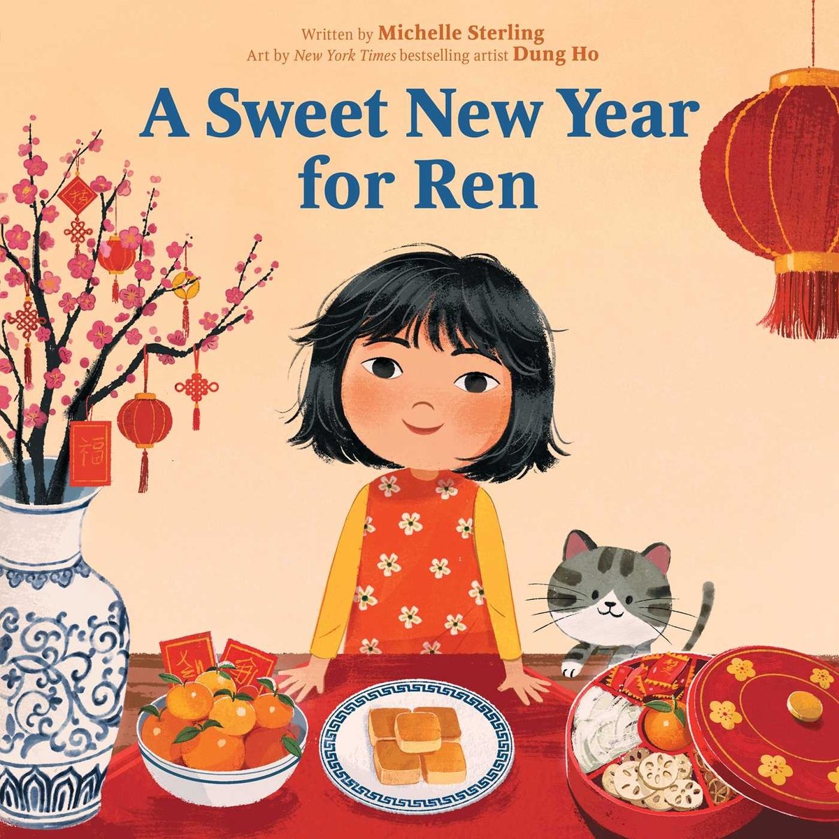 Book cover of A Sweet New Year for Ren by Michelle Sterling, Illustrated by Dung Ho, featuring a light-skinned child with chin-length black hair smiling at the viewer from behind a table filled with pineapple cakes, a bowl of tangerines, and a cherry blossom tree; a small gray cat is beside her.