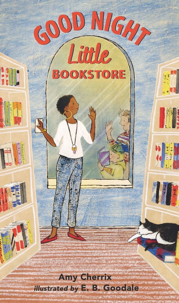 Good Night, Little Bookstore by Amy Cherrix and Illustrated by E.B. Goodale features a women inside of a bookstore with a sleeping cat on the floor and children waving through the front window of the store.