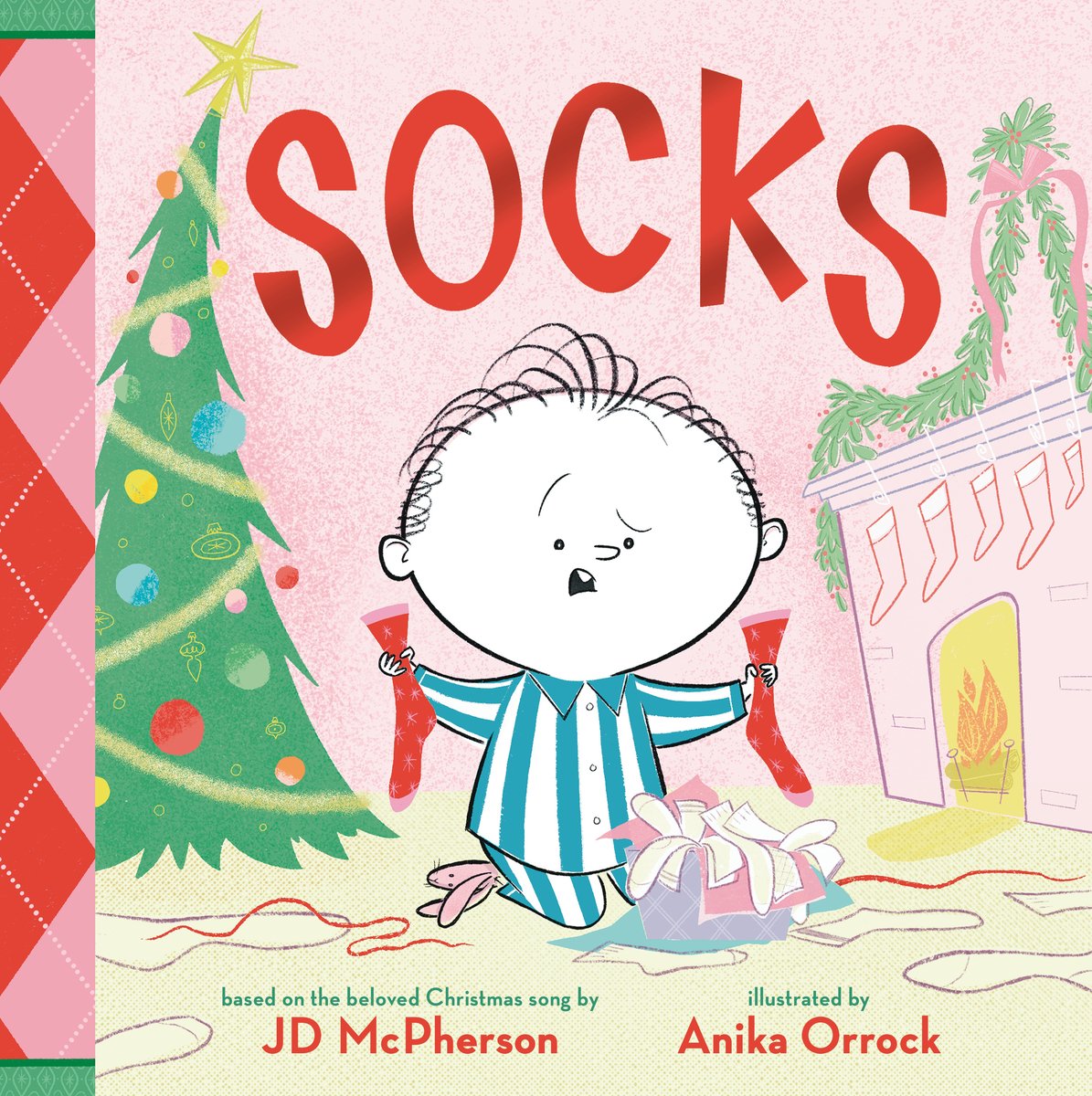 Book cover of "Socks: A Kid's Christmas Lament," written by JD McPherson and illustrated by Anika Orrock, featuring a dismayed-looking, white-skinned child in blue-striped pajamas holding two red socks over an opened present, out of which more socks tumble.
