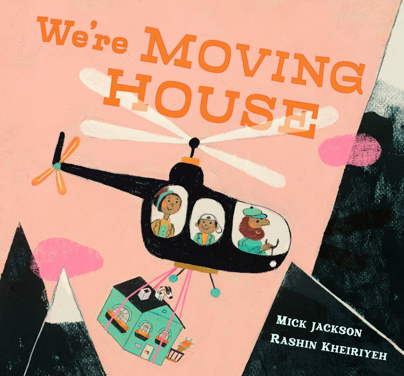 Book cover of We're Moving House by Mick Jackson, Illustrated by Rashin Kheiriyeh, featuring a brown-skinned child and two brown-skinned adults with a diversity of hair colors/textures in a black helicopter, flying with a house attached to the bottom of the vehicle with cables.
