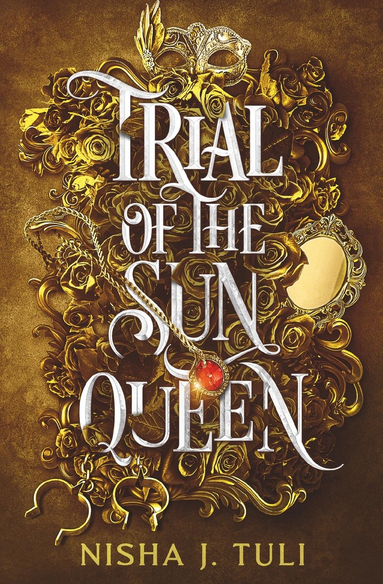 Trial of the Sun Queen by Nisha J. Tuli, book cover. A gold background with golden leaves and flowers. Hidden within the golden floral design is a golden mirror, mask, cuffs, and a necklace with a red gem in it. The title is intertwined in the desgin, in the middle.