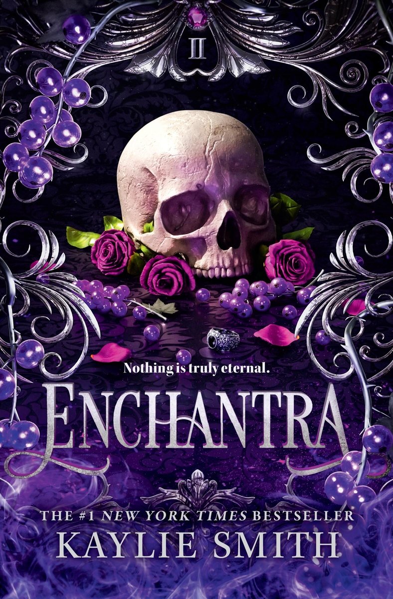 Enchantra by Kaylie Smith a romantic fantasy book cover depicting a skull on purple roses and berries surrounded by silver scrollwork and purple smoke.