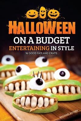 A cover of Halloween on a Budget by Rachael Rayner. There is apple Halloweenish treats sitting on a cutting board with the title at the very top of the cover.