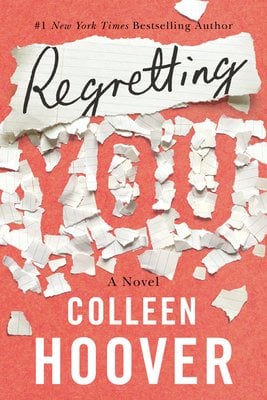 The word 'regretting' is written in cursive on a piece of paper and ripped-up pieces of paper are spelling out the word 'you' in the book title, Regretting You.