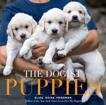 The Dogist Puppies by Elias Weiss Friedman. A photograph of a person holding three white lab puppies in their arms is the background to white and yellow title text.