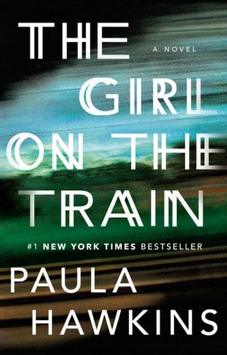 Blurred photograph as a train passes on a track with words The Girl on The Train in front.