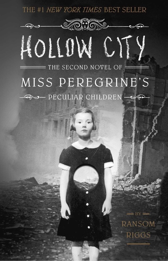Hollow City (Book II) by Ransom Riggs. Has a black-and-white photo of a victorian-era girl with short hair and a black dress with a circular hole through her middle, and a devastated city behind her.