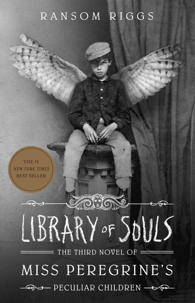 Library of Souls (Book III) by Ransom Riggs. Has a black and white photo of a victorian-dressed boy sitting on a column with wings in center of cover.
