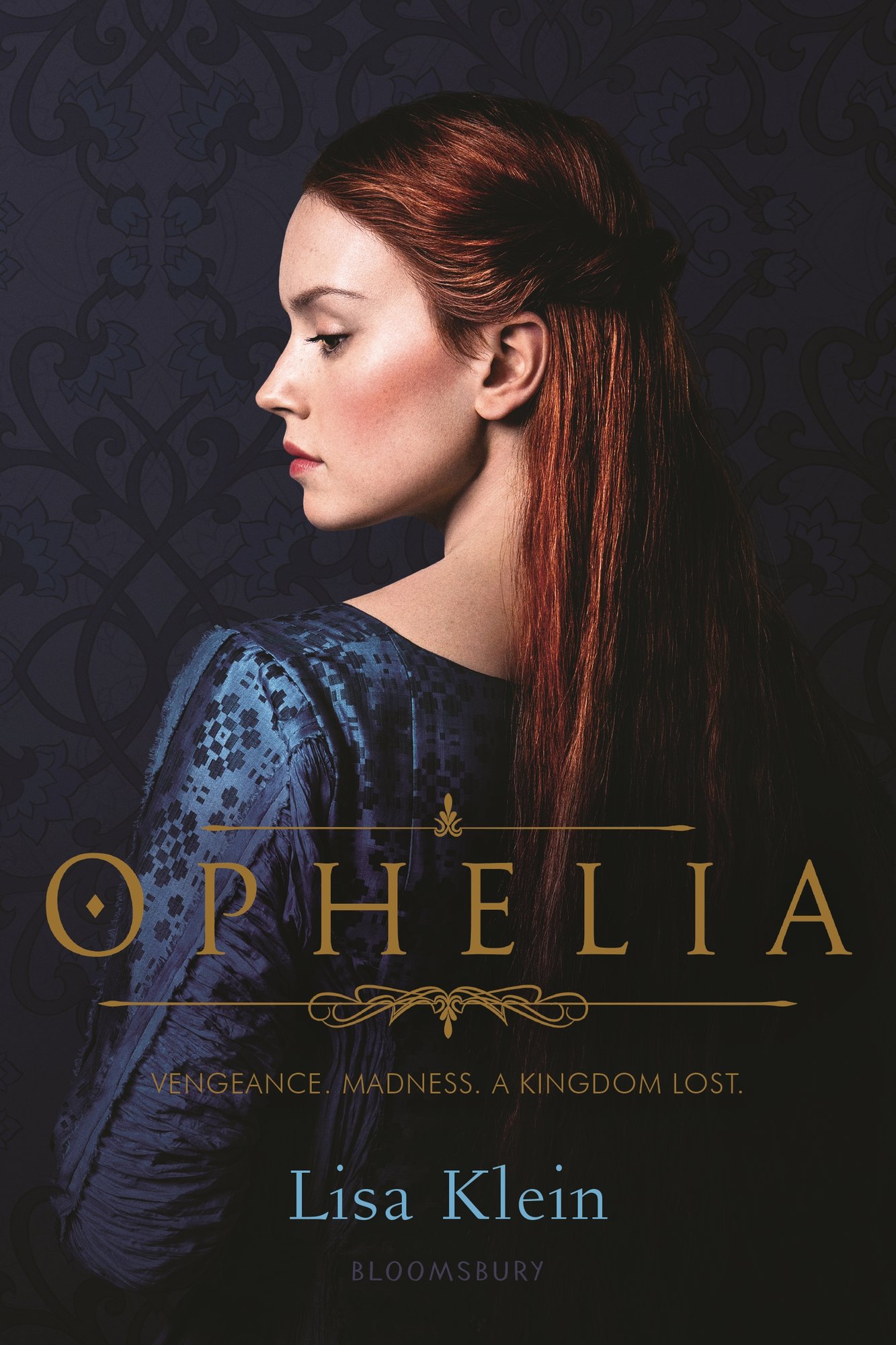 Ophelia by Lisa Klein, a Shakespearen retelling book cover depicting a young woman with long, red hair turned to the side and facing the left with a pensive, serious look on her face. She is wearing a period-appropriate blue, patterned dress and the background behind her is a darker, almost navy blue.