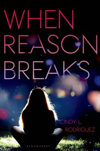 Book cover of "When Reason Breaks by Cindy L. Rodriguez. Shows a girl sitting cross-legged facing away from the cover, light shining onto her and the rest of the background is dark blue with colourful lights and shadows.