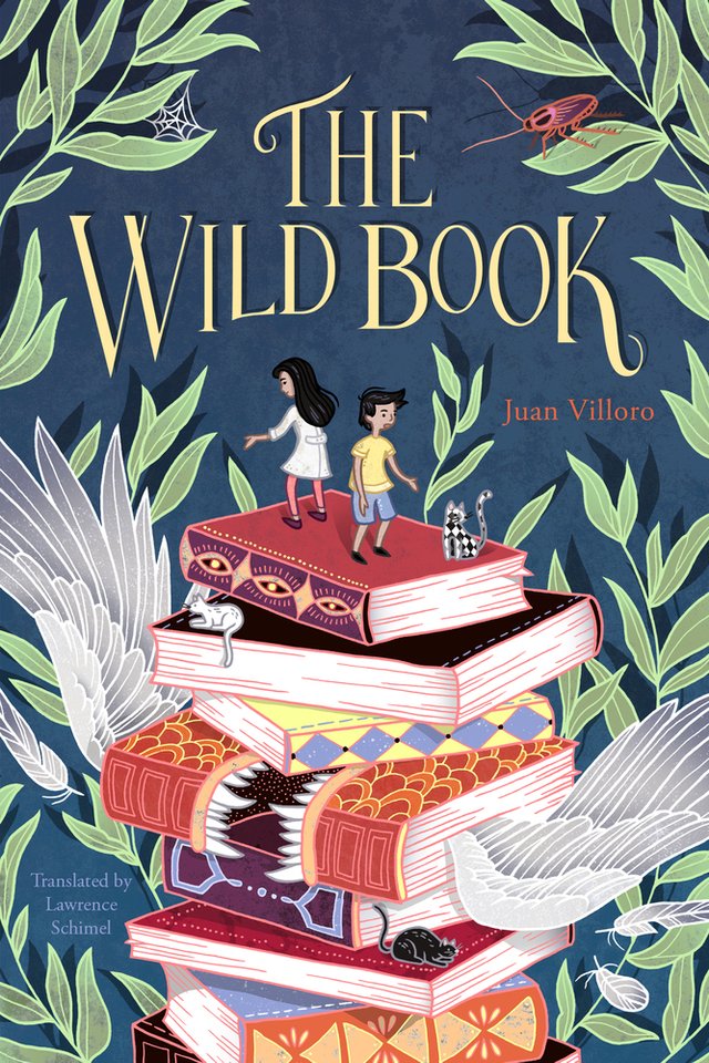 The Wild Book by Juan Villoro, book cover. Blue-themed with green leaves on the edges, a stack of books in the center with two tiny children standing on top. The book is magically affected, showing wings and teeth.