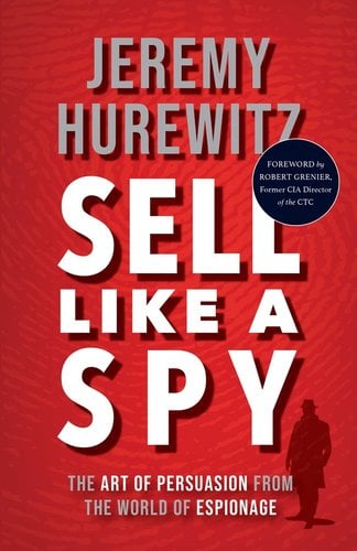 Sell Like A Spy: The Art of Persuasion from the World of Espionage by Jeremy Hurewitz, red cover books with a finger print transparent in the background, a shadowed man in the corner of the right side of the book.