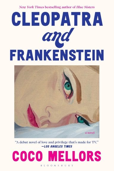 Cleopatra and Frankenstein by Coco Mellors book cover. A woman's face is painted in watercolor and she is looking at the 'camera'. She has bright green eyes, light brown eyebrows and her bottom lip is brighter pink than the top. She is depicted sideways, as if she is laying on a pillow.