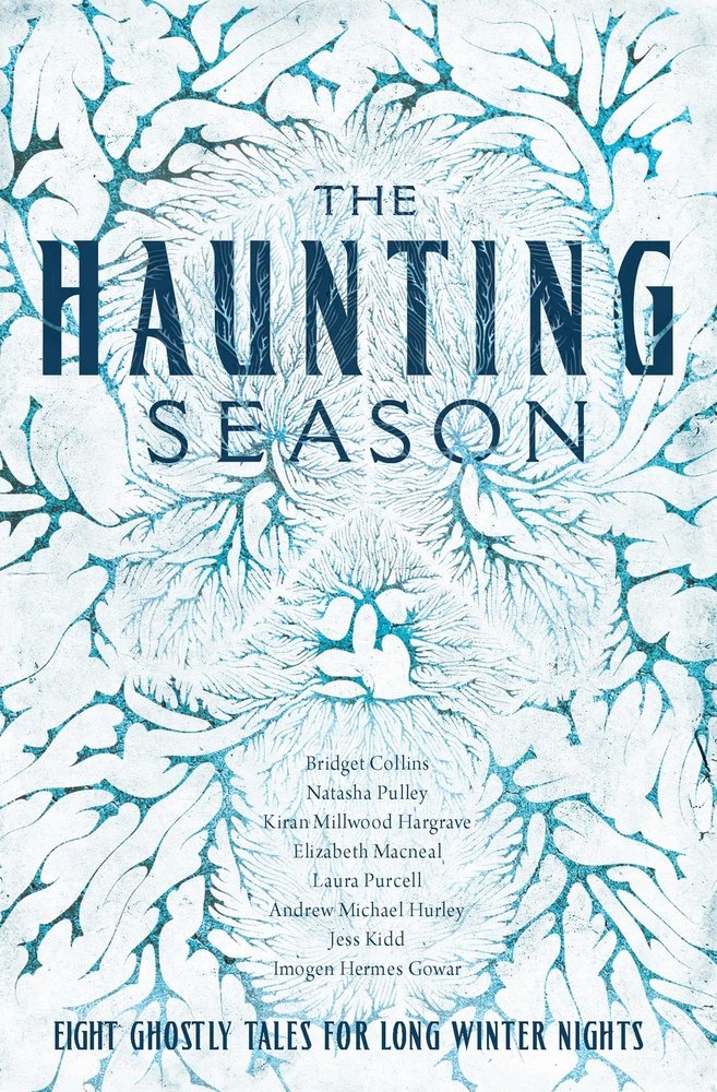 The Haunting Season by Natasha Pulley, et al. A white background with icy blue spikes forming a skull.