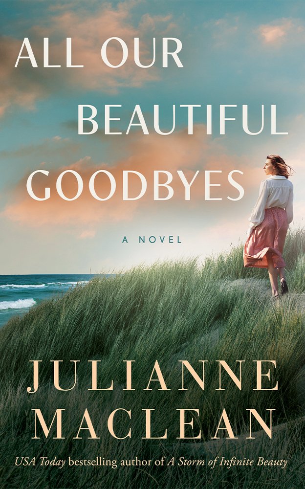 All Our Beautiful Goodbyes by Julianne MacLean historical romance book cover features a woman in a flowing skirt and collared shirt, standing on a grassy dune, gazing toward the horizon where the sky meets the sea. The title is prominently displayed, rendered in elegant serif font