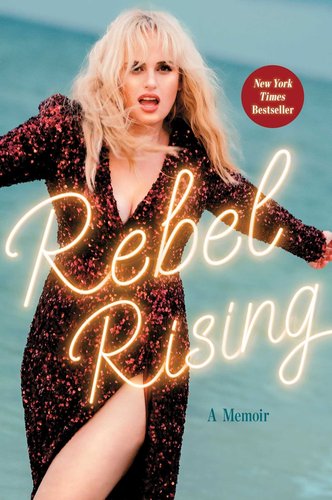 Book jacket for Rebel Rising by Rebel Wilson. The actress poses on the cover in front of the ocean with a red, sparkly dress. Her blonde hair flows in the wind.