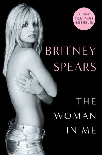 Book cover for Britney Spears' The Woman in Me with pink and white text and a black-and-white image of Spears against a black background