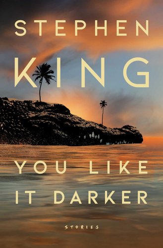 You Like It Darker: Stories by Stephen King shows the ocean with an island in the distance holding two palm trees as the sun sets making a blue and yellow haze in the sky and reflection of the ocean.