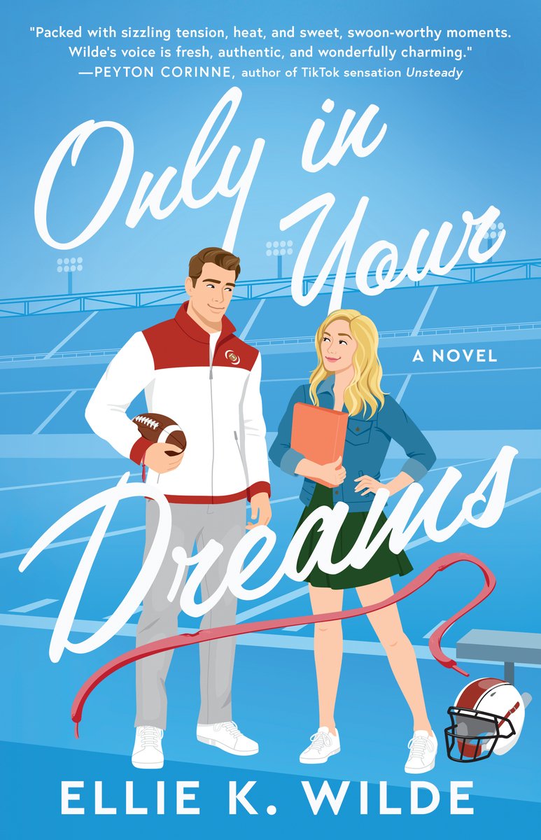 Only In Your Dream by Ellie K. Wilde book cover features a lively, illustrated scene set against a bright sky-blue background that evokes the fresh, breezy mood of a small-town sports romance. On the left is a young man in athletic gear—he’s wearing a red and white jacket and gray pants, holding a football helmet in one hand, hinting at his role as a football coach or player. Beside him is a young woman with long blonde hair, dressed casually and confidently, holding a clipboard or notebook—this suggests she may be more grounded or coming into this world from an outside perspective. The title “Only in Your Dreams” is written in a flowing white script across the top half of the cover, creating a sense of aspiration and whimsy. Below, the author’s name is set in all-caps in a simpler white font.