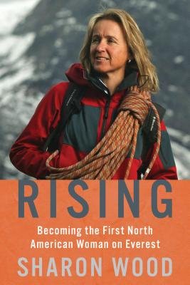 Rising: Becoming the First North American Woman on Everest by Sharon Wood shows Wood when she was on Everest with a red jacket and climbing rope strapped to her.