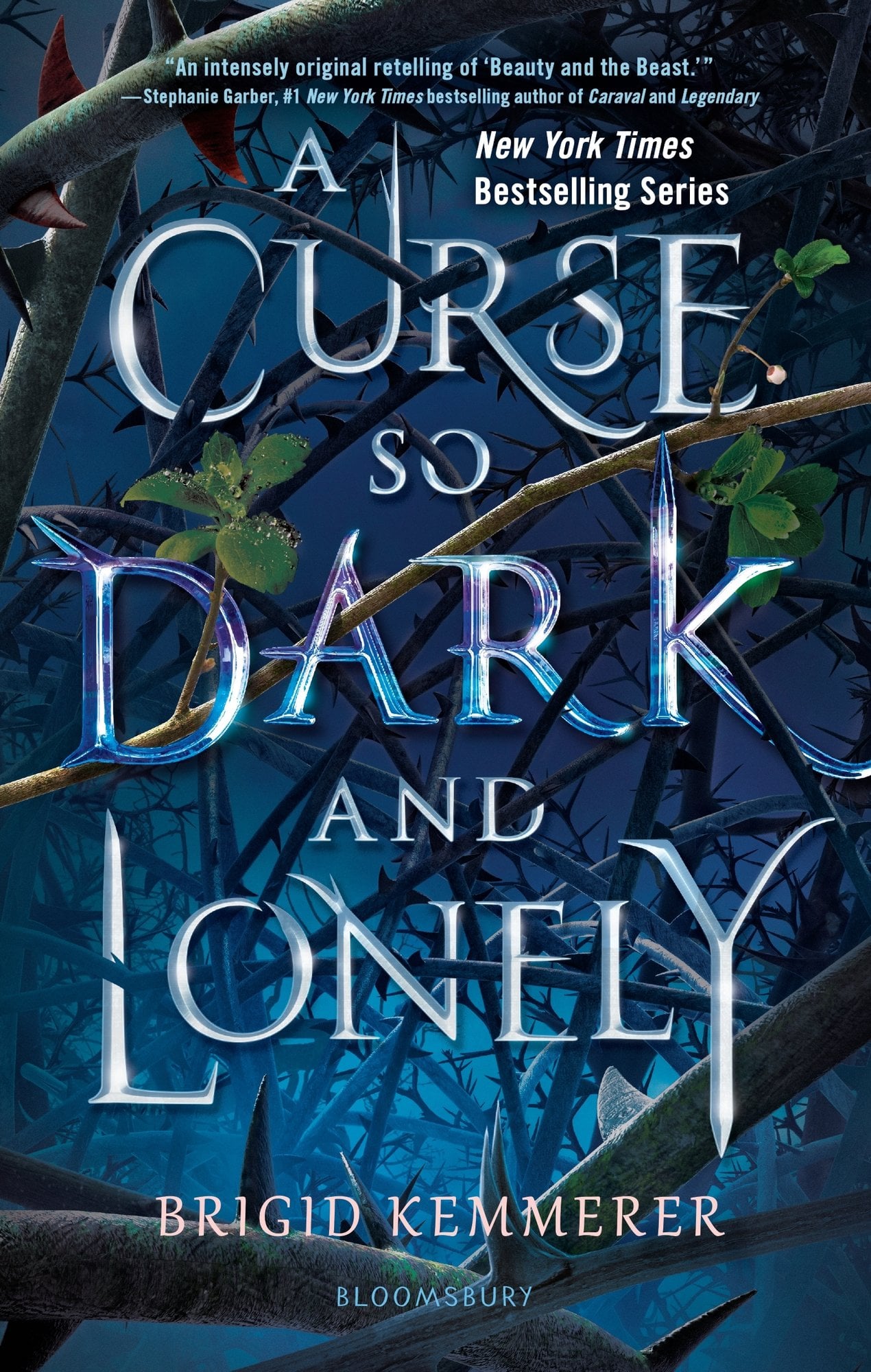 Cover of "A Curse so Dark and Lonely," by Brigid Kemmerer. It has an all blue background with thorns and branches.