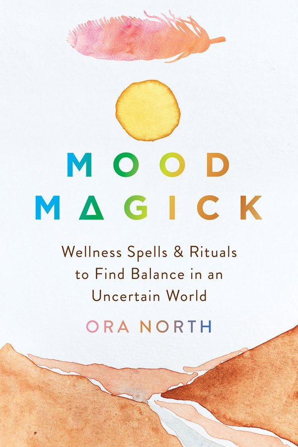 Mood Magick by Ora North witchy book cover depicting a white background with a pink and orange watercolor feather at the top, a yellow sun underneath that, and orange hills at the bottom. The title is in the center, changing colors from left to right in blue, green, yellow, and orange, with the A as a delta symbol.