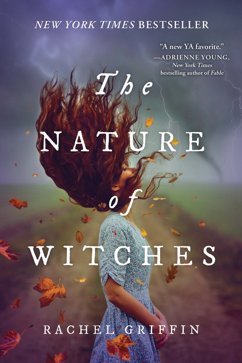 The Nature of Witches by Rachel Griffin shows a red haired girl with her hair up in the air as orange leaves swirl around her and lightning strikes in the distance.
