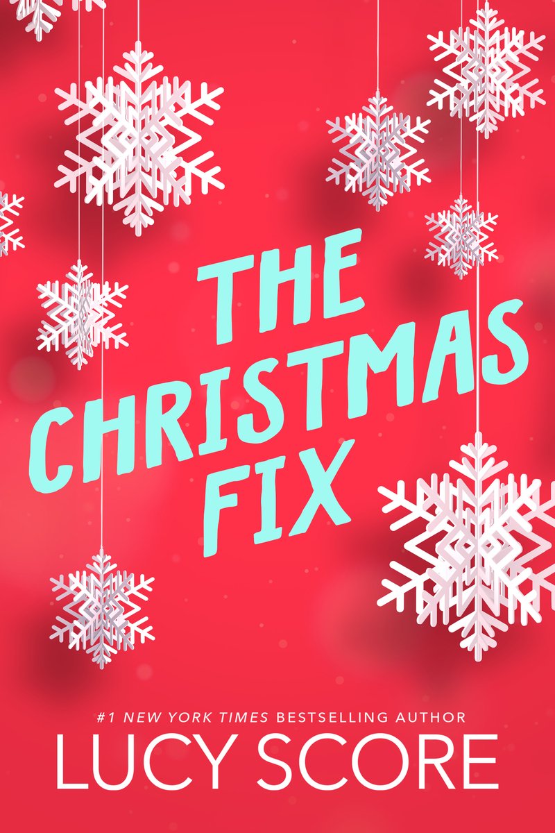 Cover of The Christmas Fix by Lucy Score. A red background with paper snowflakes.