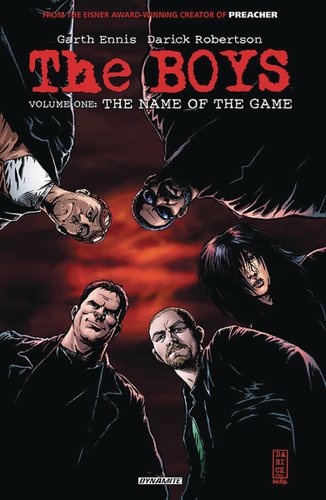 Five people stand staring down at the viewer, all dressed in black. A red and black sky is behind them.