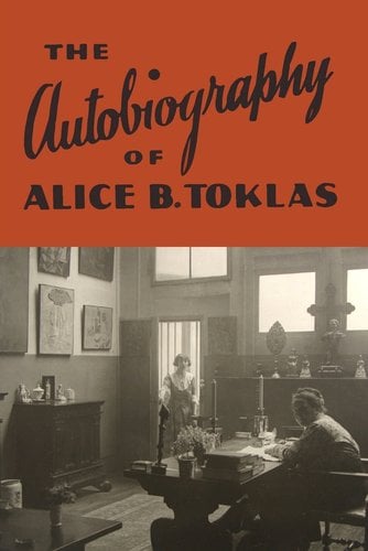 The Autobiography of Alice B. Toklas by Gertrude Stein cover; black and white photo of two women, one sitting a desk with books, candles, and papers on it while another young woman enters the room holding the door