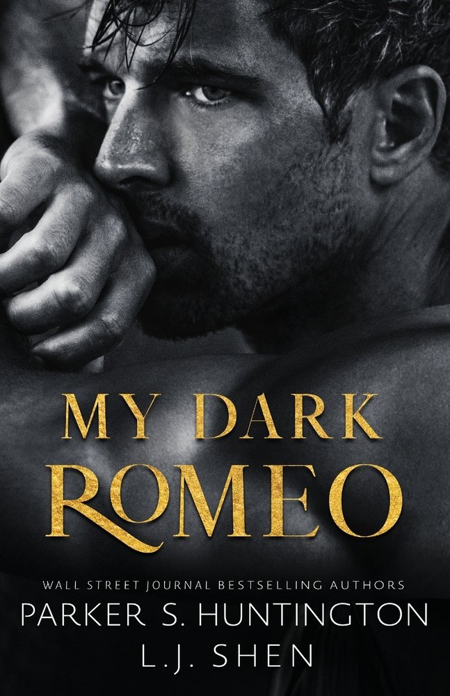 A sweaty man stares off into the distance. The cover is gray yet sensual. The title is in gold letters at the bottom. The author's name is in white letters below the title.