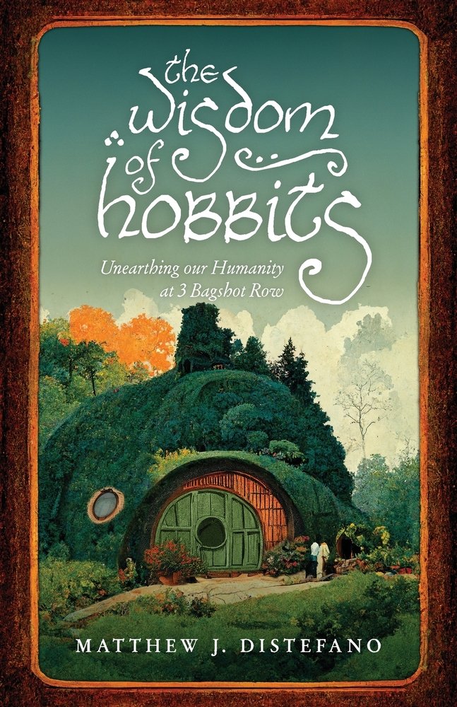 The cover for The Wisdom of Hobbits. There is a drawing a green and idyllic looking hobbit hole. Behind it are trees and blue skies.