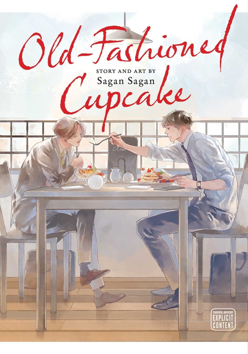 The cover of Old-Fashioned Cupcake by Sagan Sagan depicting two men sitting at a table facing each other. One is feeding the other.