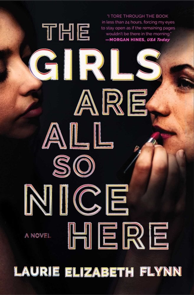 The book cover for 'The Girls Are All So Nice Here' by Laurie Elizabeth Flynn. 'Girls' is in white text where the rest of the title is an outlined ombre green-pink on a black background. To the left and right of the title text are shadowed faces of two girls, one putting red lipstick on the other.