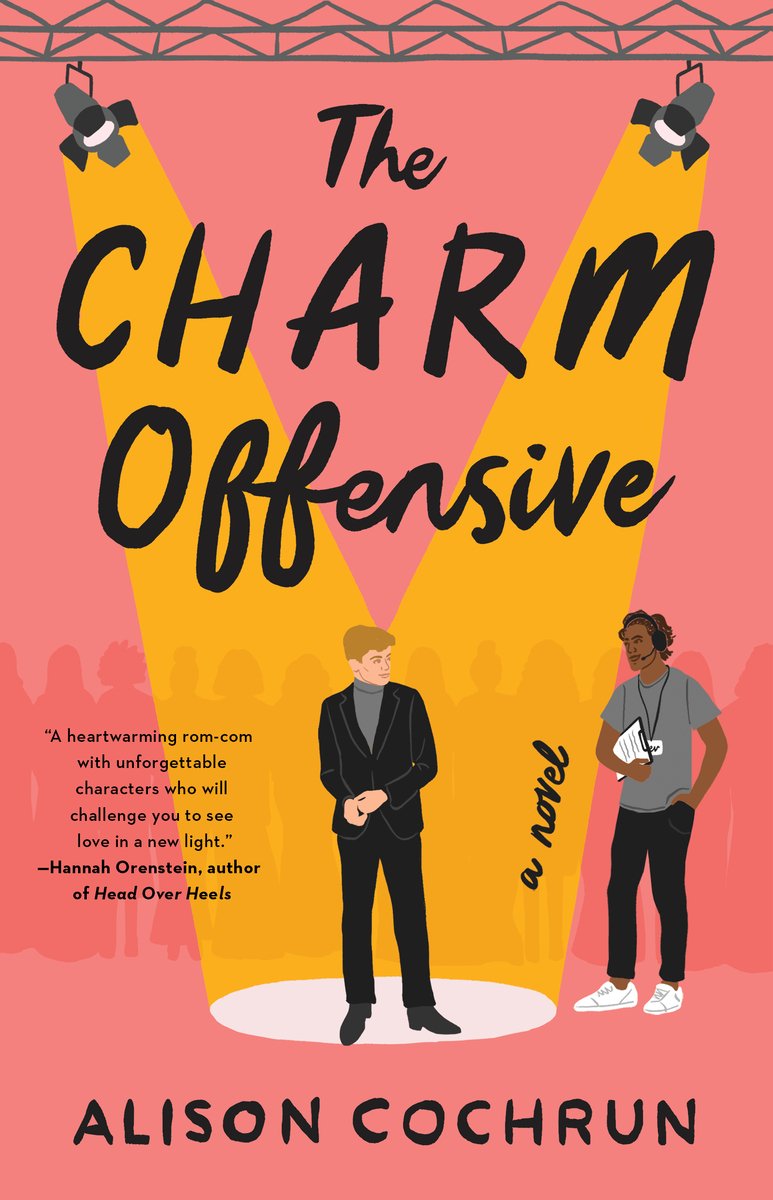 The Charm Offensive by Alison Cochrun a queer rom com book cover depicting an illustration of two men (one in a suit the other in casual wear) under stage lights with silhouettes of people behind them on a salmon colored background.