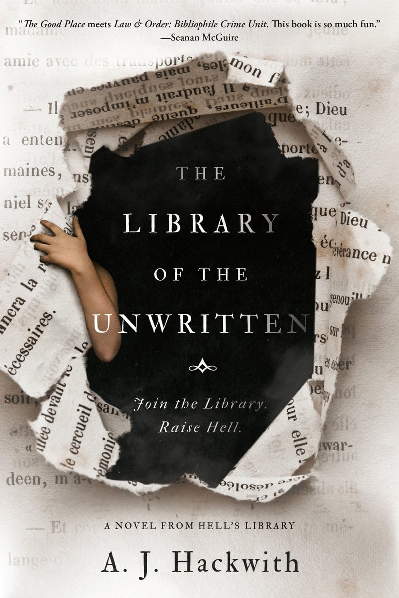 The Library of the Unwritten by A.J. Hackwith, a horror novel book cover of a dark hole appearing through ripped book pages with a human arm grasping onto the edges of the ripped edges, seemingly hiding themselves from view.