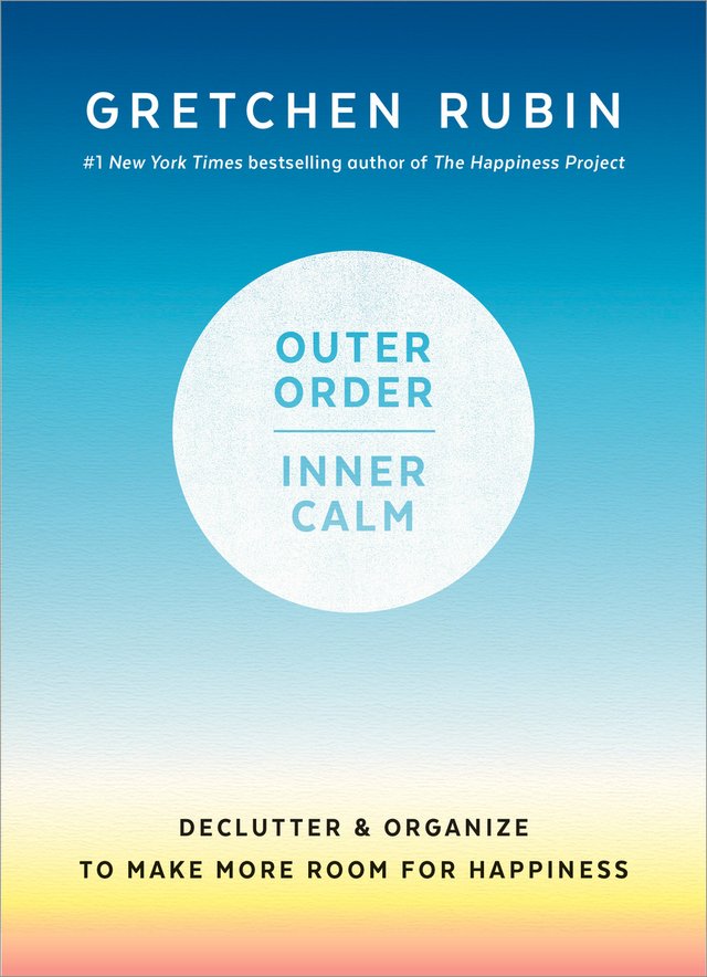 Outer Order, Inner Calm by Gretchen Rubin, dark blue ombre to yellow color throughout background of cover, circle where title sits in blue color, book cover