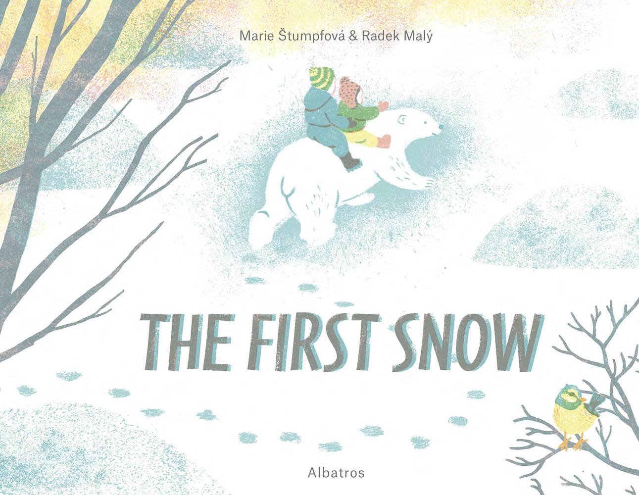 Book cover of "The First Snow" by Marie Štumpfová & Radek Malý, featuring two children in colorful snow gear riding on the back of a polar bear as it walks away from the viewer through a snowy wooded landscape.